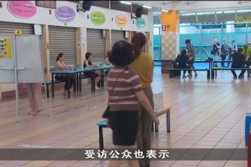 【GE2025】不少选民一大清早冒着大雨赶到明智小学投票