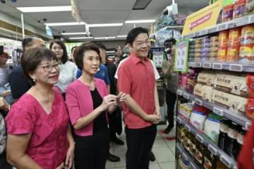 大约97.3%本地公民家庭已领取邻里购物券